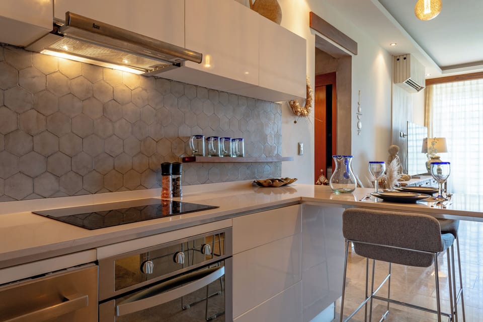Luxury Apartment, Balcony, Garden View | Private kitchen | Fridge, microwave, oven, stovetop