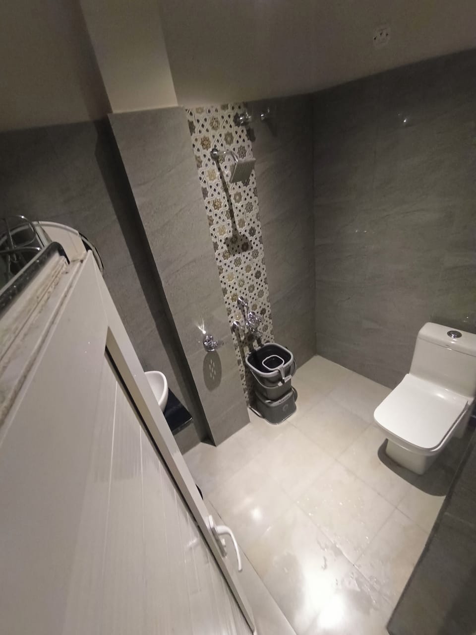 Shower, rainfall showerhead, towels, soap