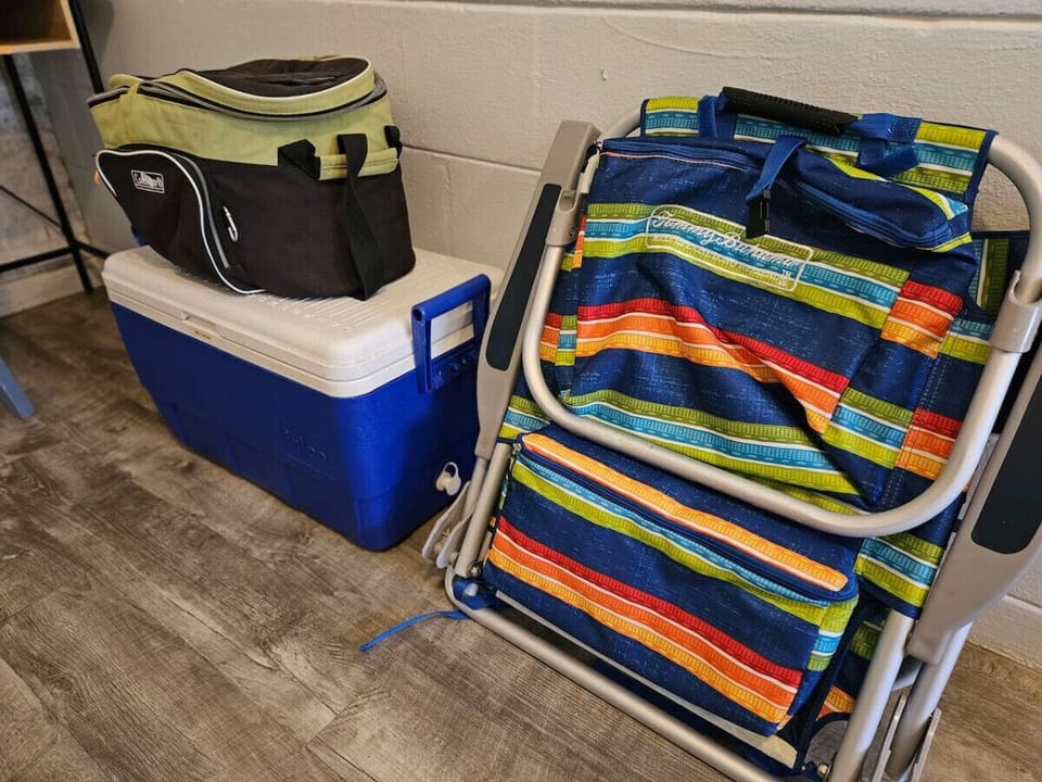 4 Beach chairs and small cooler provided.