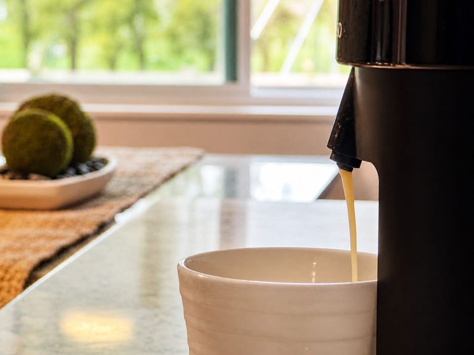 Wake up to the rich aroma of complimentary Nespresso coffee.