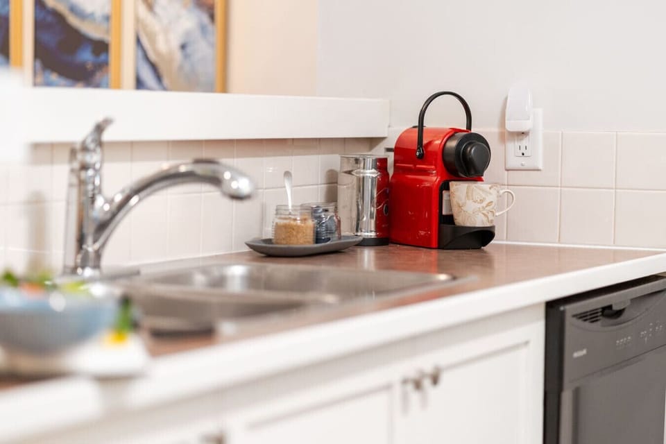 Nespresso pods, ground coffee, tea, sugar, and oil to kickstart your stay.