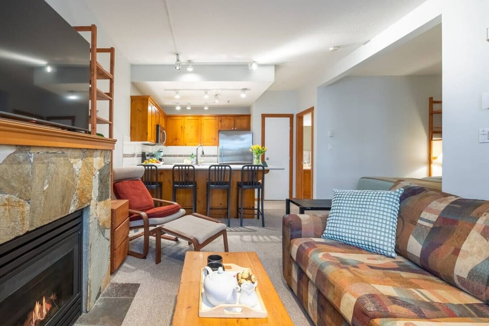 Cozy living area with comfortable seating for four—perfect for relaxing together.
