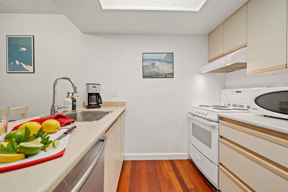 A fully equipped kitchen featuring an island.