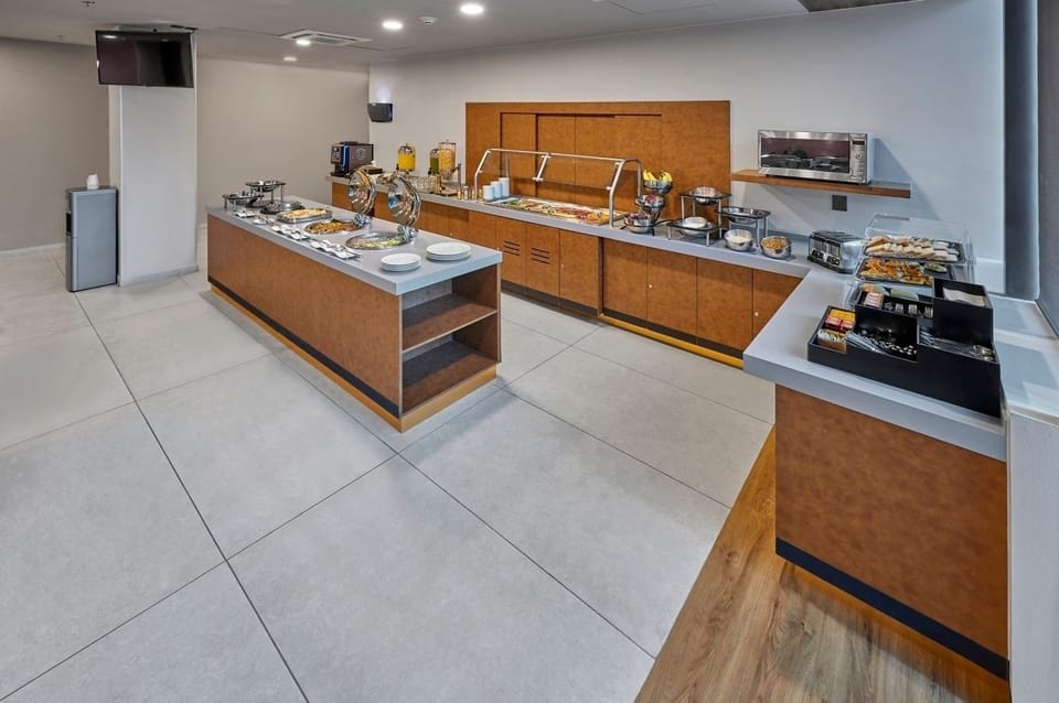 Browse the breakfast spread with plenty of space to serve.