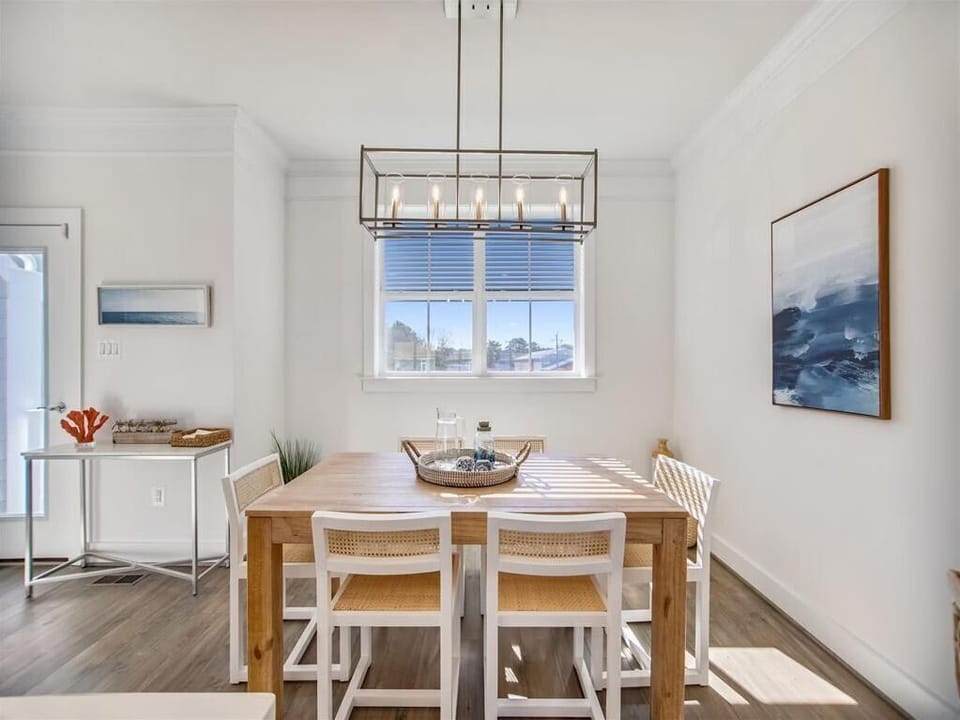 Experience coastal living in this spacious waterfront property featuring a modern kitchen, a cozy loft, and inviting patio views, all within walking distance to the beach and complete with relaxing vacation amenities and a community pool.