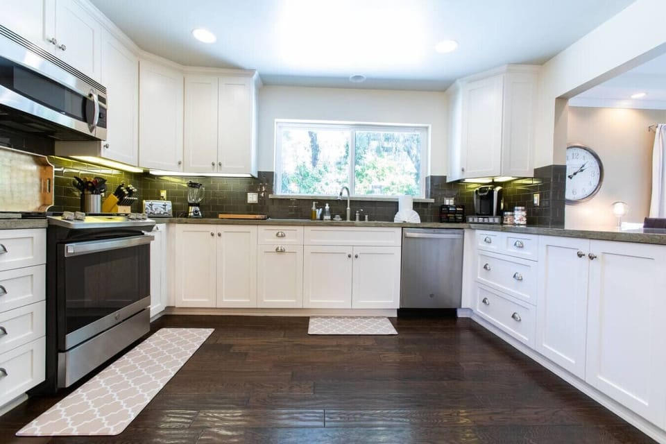 Fully stocked with cooking essentials, utensils, and cookware — perfect for home-cooked meals.