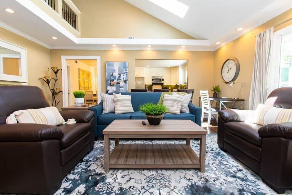 Open living and dining space with a comfy sleeper sofa for extra guests.