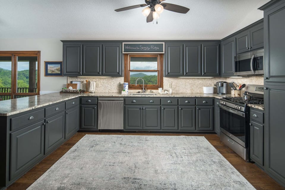 Fully equipped kitchen with granite countertops and stainless steel appliances