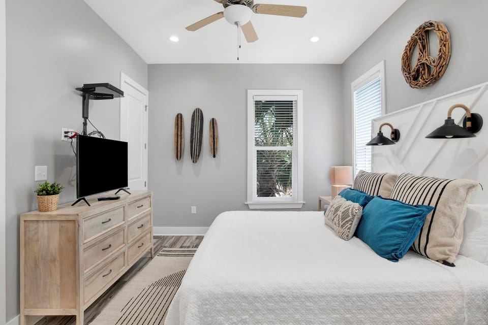 Quiet space with cozy bedding, a relaxed vibe, and all the essentials for a restful night’s sleep.
