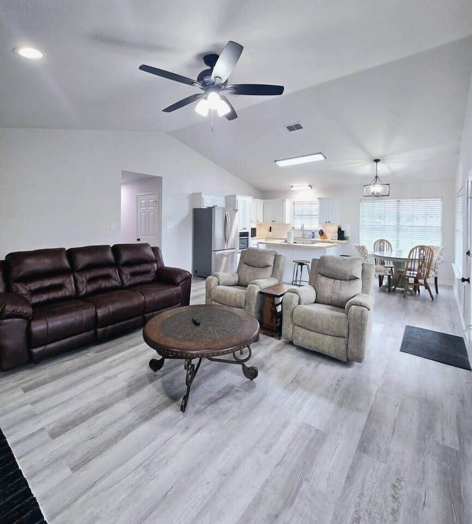 Open living, kitchen, dining areas