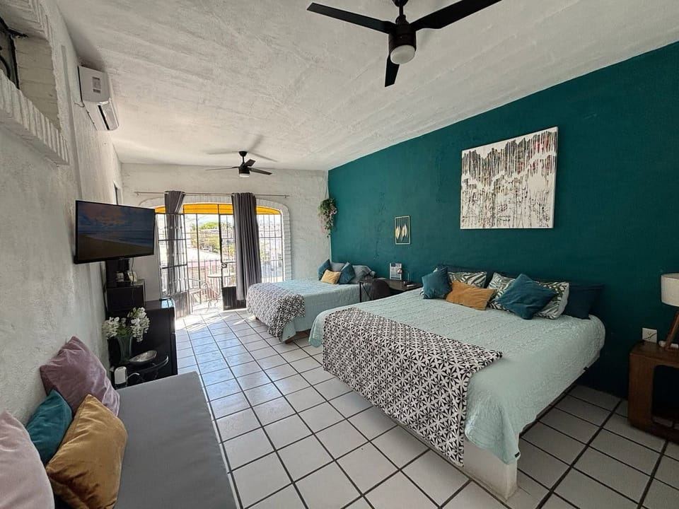 Family Quadruple Room | Individually decorated, individually furnished, desk, laptop workspace