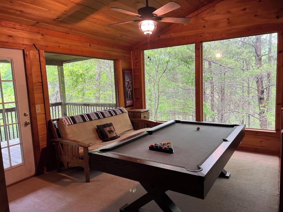 "While Playing Pool, Enjoy The Stunning Outdoor Views"