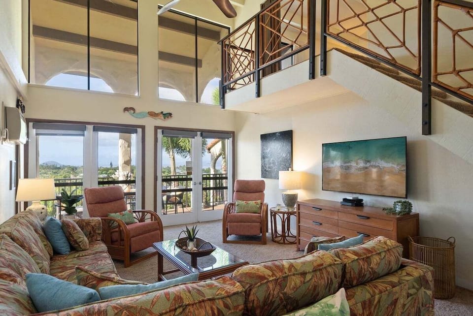 The living room features a comfortable sofa bed for extra sleeping arrangements.