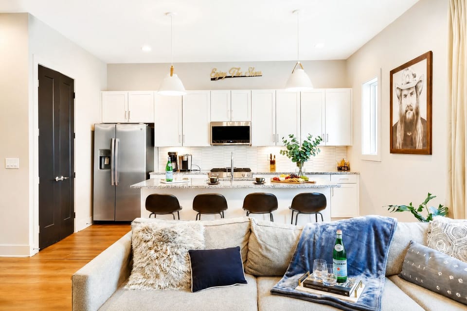 Open kitchen and living room keep the whole group connected, whether someone's cooking or sinking into the sectional after a day out exploring