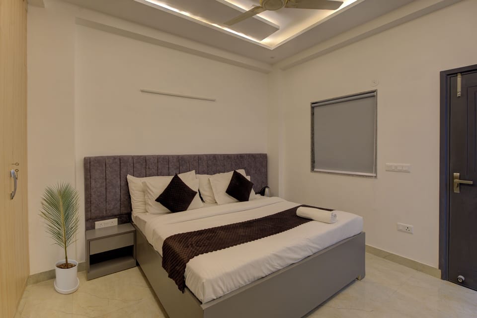 Family Apartment, City View | Laptop workspace, iron/ironing board, free WiFi