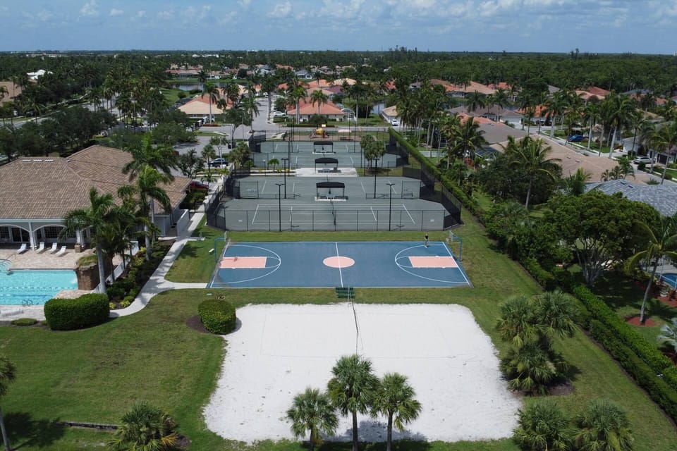 The clubhouse features tennis, pickle ball, basketball and sand volleyball courts.