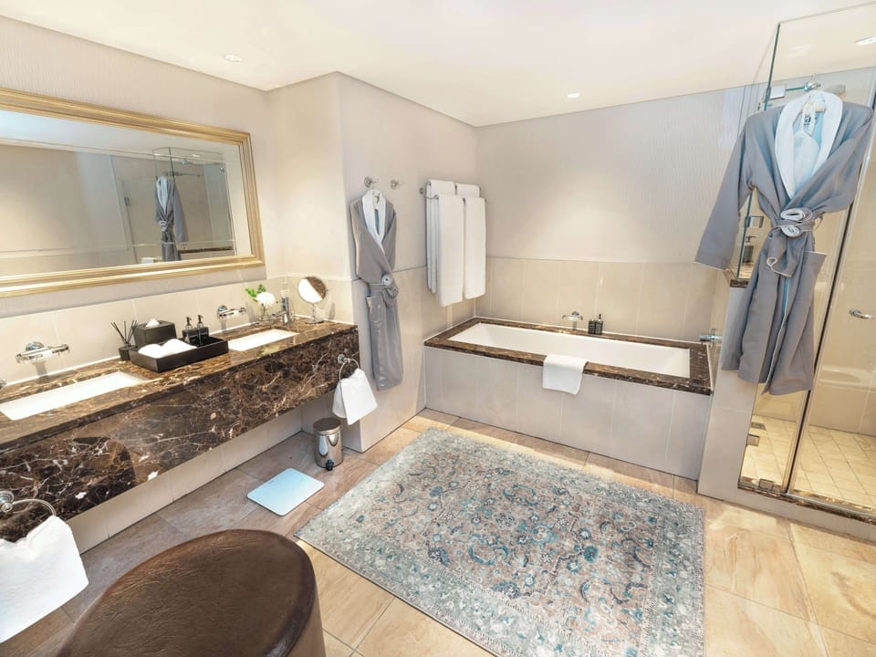 Separate tub and shower, deep soaking tub, free toiletries, hair dryer