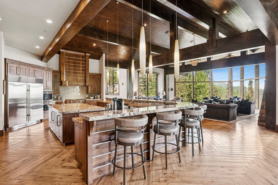 wrap around bar and gourmet kitchen