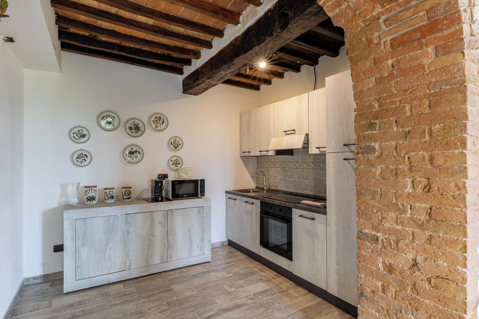 Apartment, Hill View | Private kitchen | Espresso maker, coffee/tea maker, electric kettle, highchair