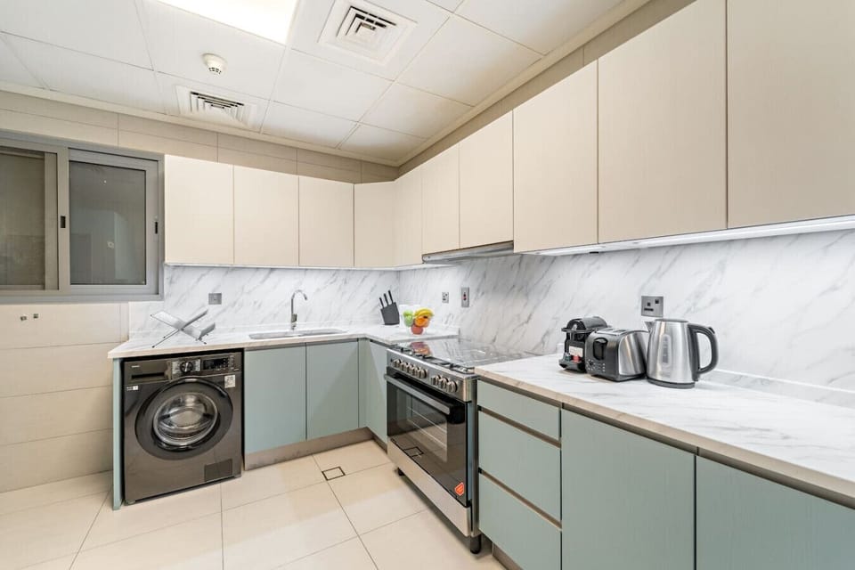Kitchen: Modern design with sleek finishes, perfect for culinary adventures in Dubai!