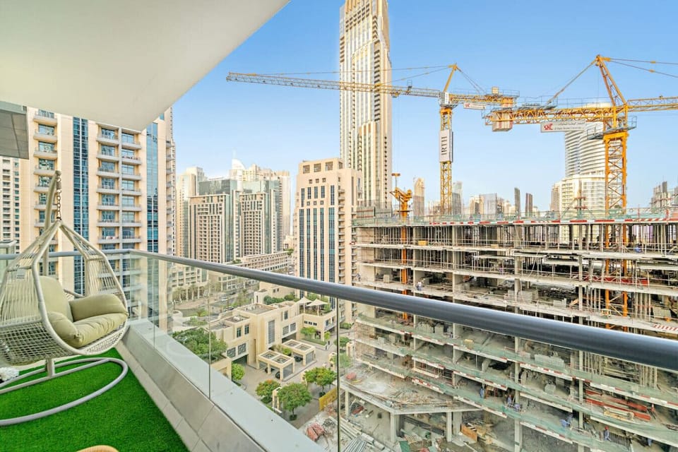 Balcony: Sip coffee while enjoying stunning cityscape views from your private retreat!