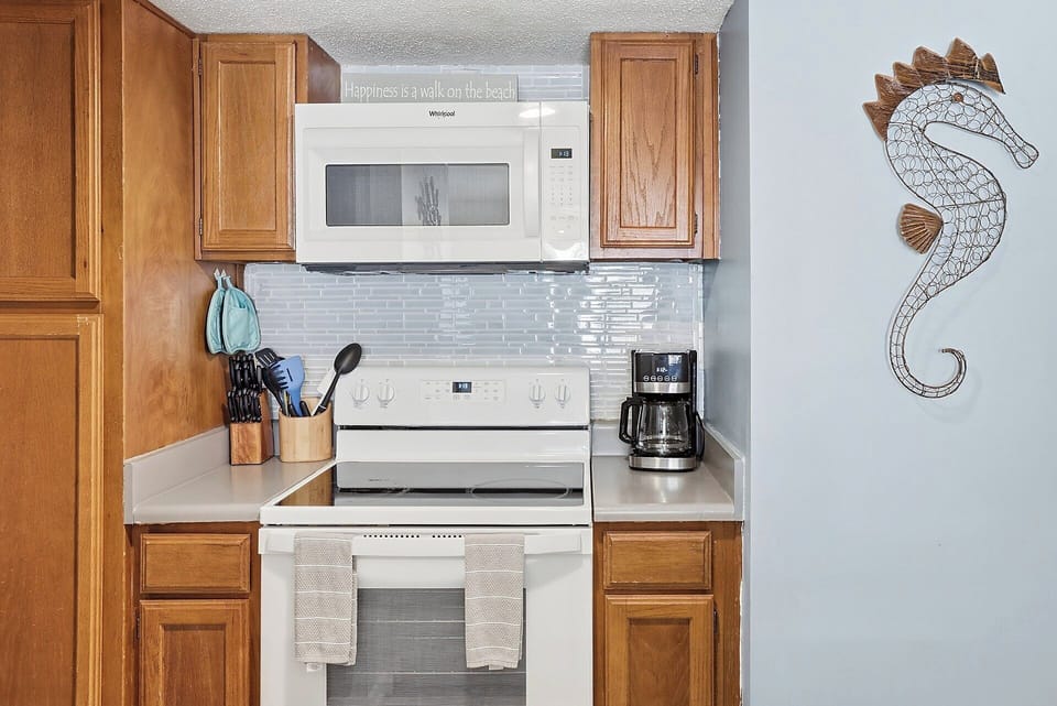 Standard coffee maker, full size range and microwave
