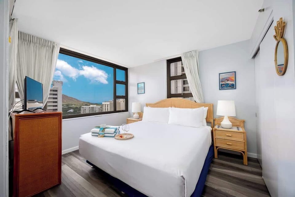 Drift into a peaceful sleep in your bedroom, which features a comfortable king-size bed, a nice view from your windows, and a 32" flat-screen TV for your enjoyment.
