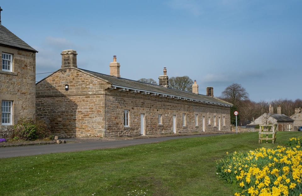 Lakeside Cottages - front aspect of the sensitively restored cottages, originally the earliest built cottages in Capheaton village