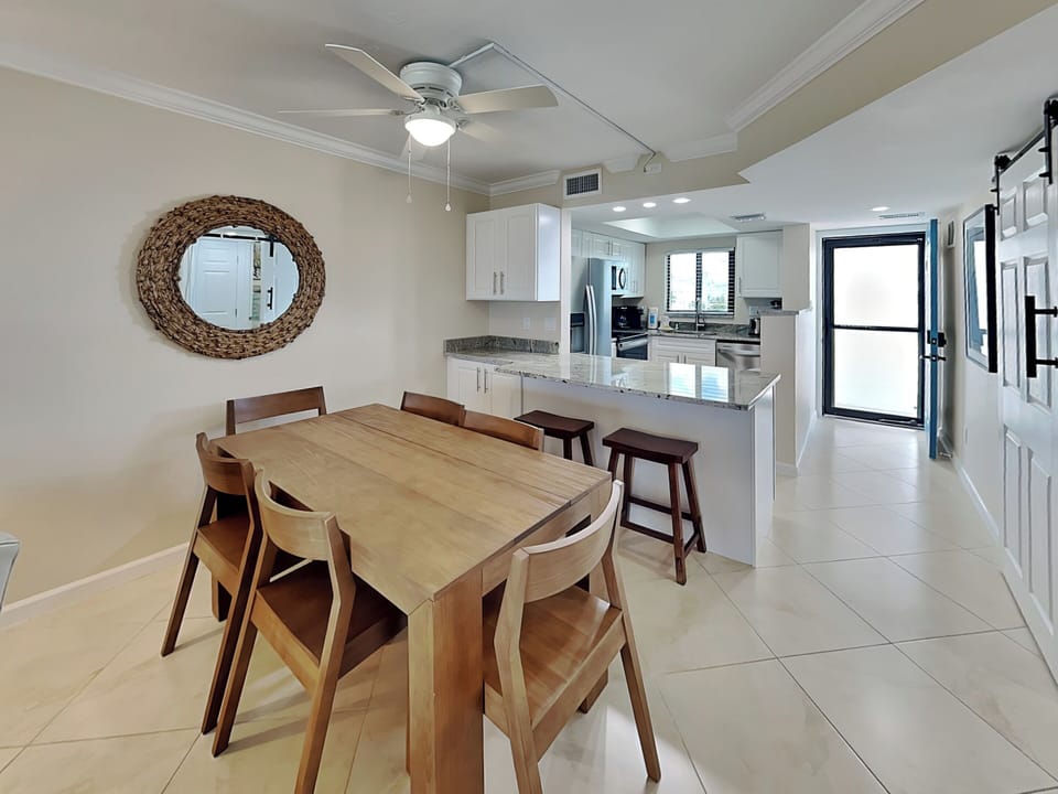 Dining Area with Seating for Six + Breakfast Bar Seating for Two