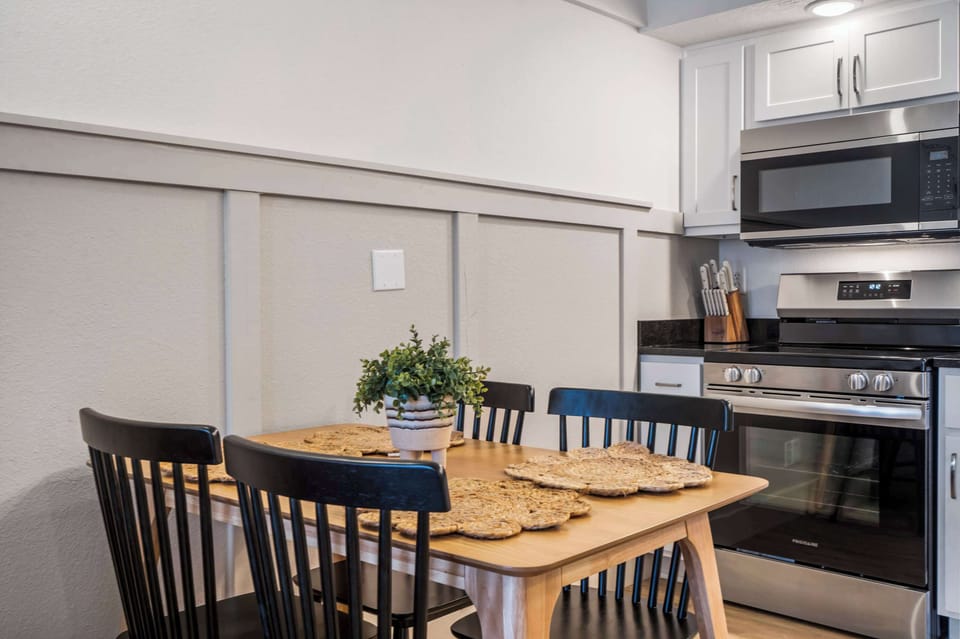 Make mealtime memories together at the dining table, seating 4