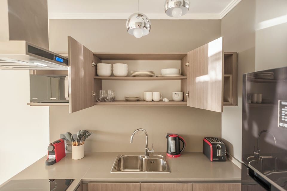 Deluxe Apartment, Park View | Private kitchen | Coffee/tea maker, electric kettle