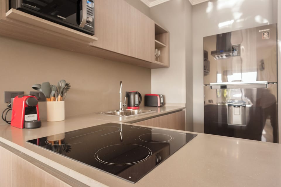 Deluxe Apartment, Park View | Private kitchen | Coffee/tea maker, electric kettle