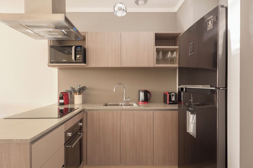 Deluxe Apartment, Park View | Private kitchen | Coffee/tea maker, electric kettle
