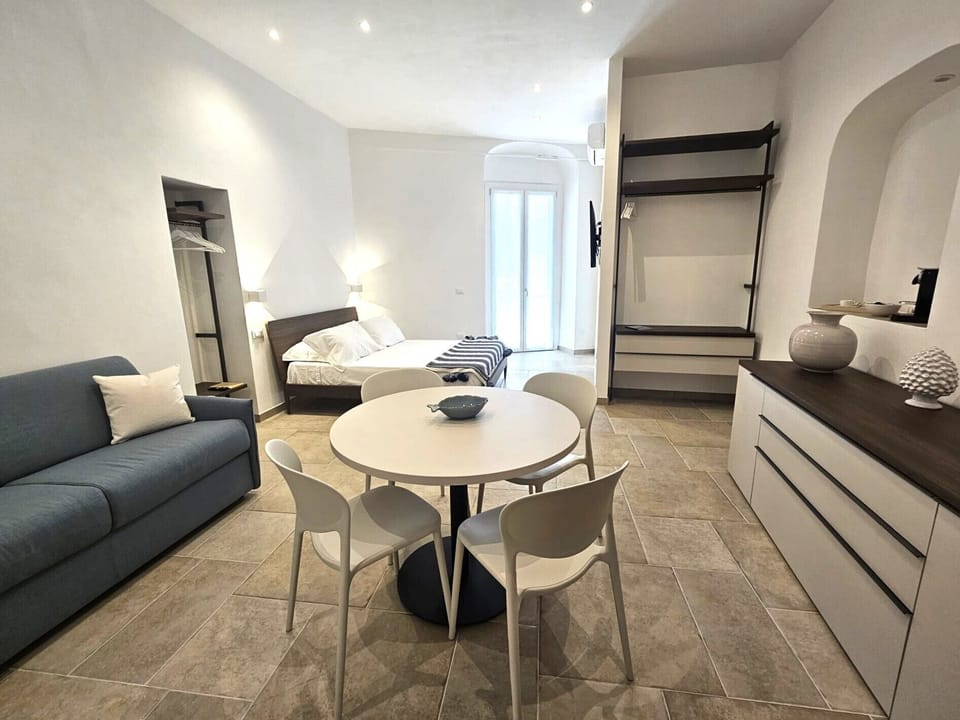 Studio, 1 Double Bed with Sofa bed, Balcony, Partial Sea View | Living area | 43-inch Smart TV with digital channels