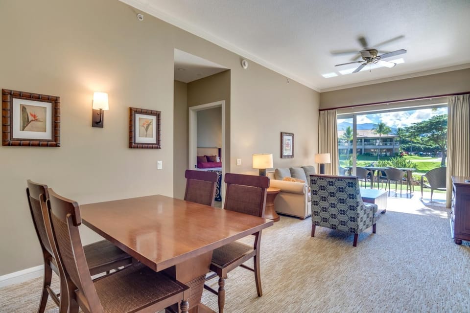 Spacious interior with dining, lounge, bedroom, and scenic lanai. HKK-108