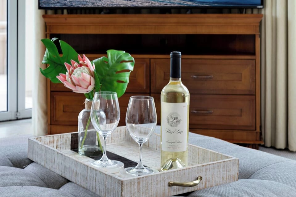 Chilled wine, tropical blooms, and relaxation await in paradise. HKK-220