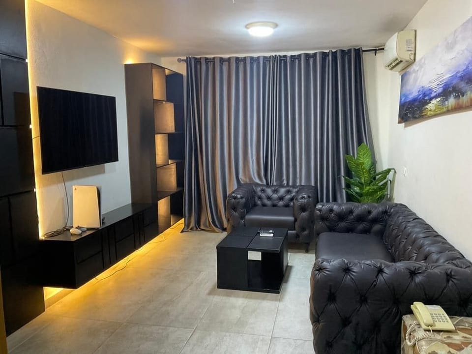 Suite | Living area | 75-inch Smart TV with cable channels, Netflix, streaming services