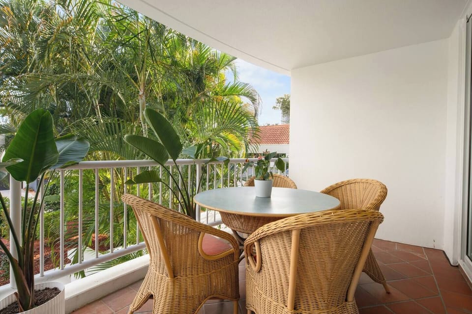 Soak in peaceful treetop views while enjoying the calming breeze from your private balcony tucked away above resort gardens.