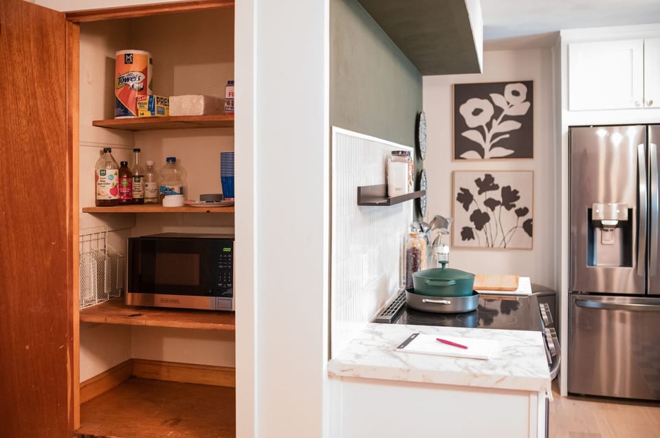 Pantry with essentials, microwave