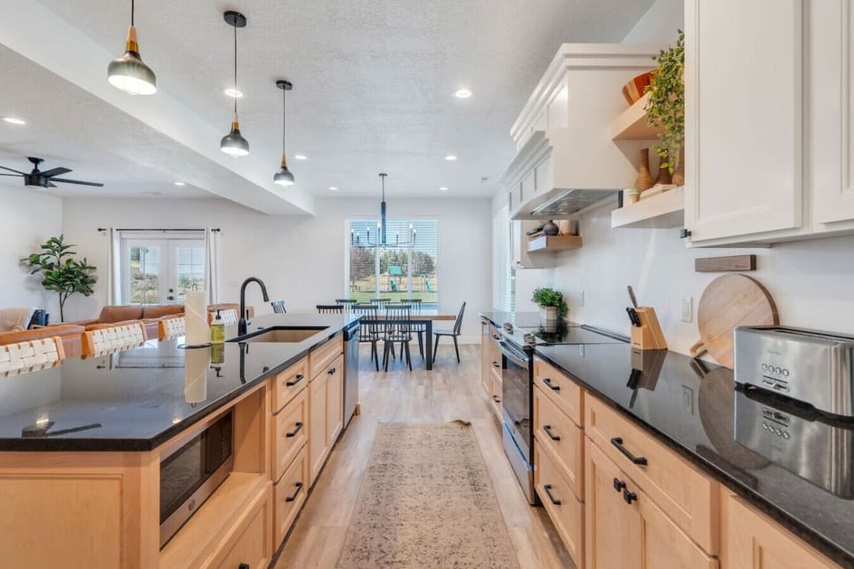 Keurig coffee makers, a crockpot, air fryer, and plenty of prep space for meals of any size.