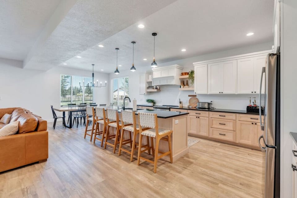 Savor meals and shared laughter in your expansive, sunlit gathering area.