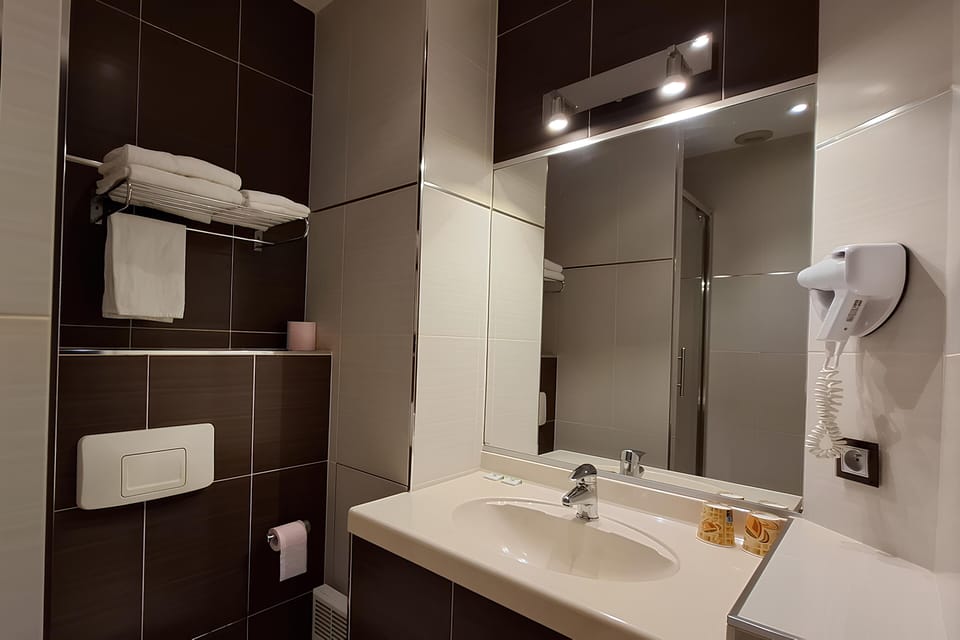 Shower, free toiletries, hair dryer, towels