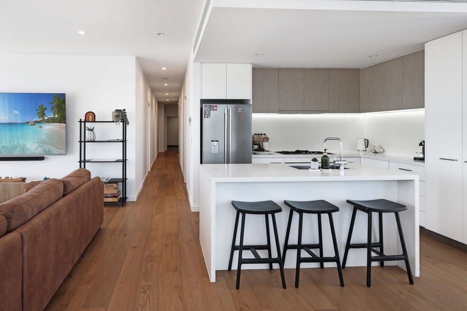 Modern kitchen with island bench and bar seating, perfect for casual dining
