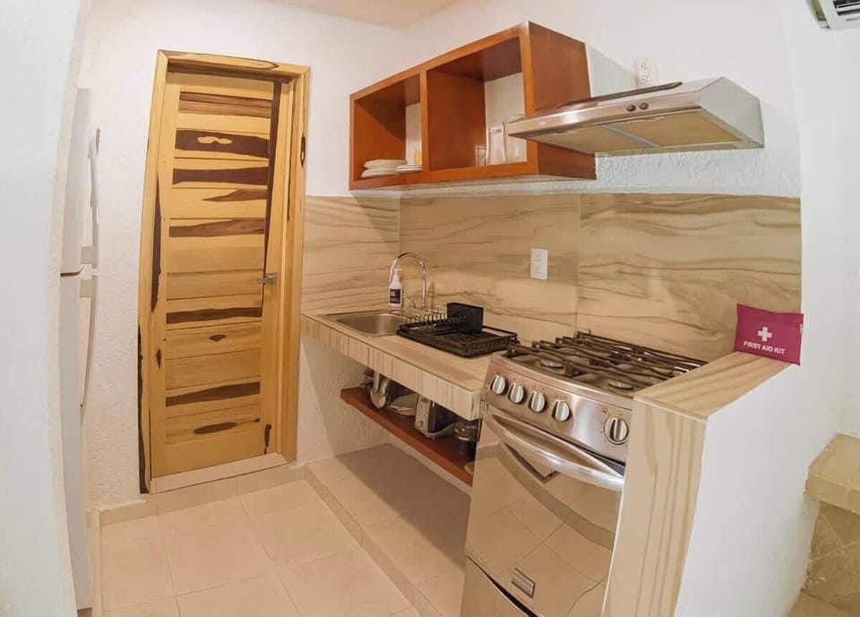 Kitchen with cookware and essentials