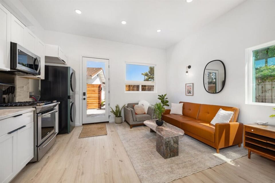 Open concept living area with a lot of natural light