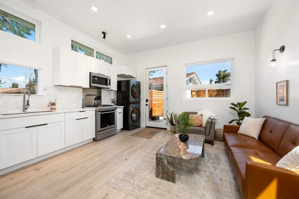 Open concept living area with a lot of natural light
