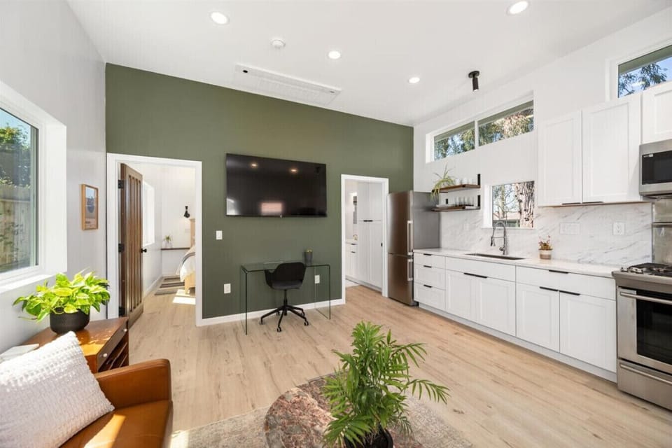 Open concept living area with a lot of natural light