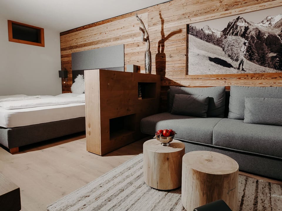 Superior Suite, Mountain View | Living area | 50-inch flat-screen TV with satellite channels, TV