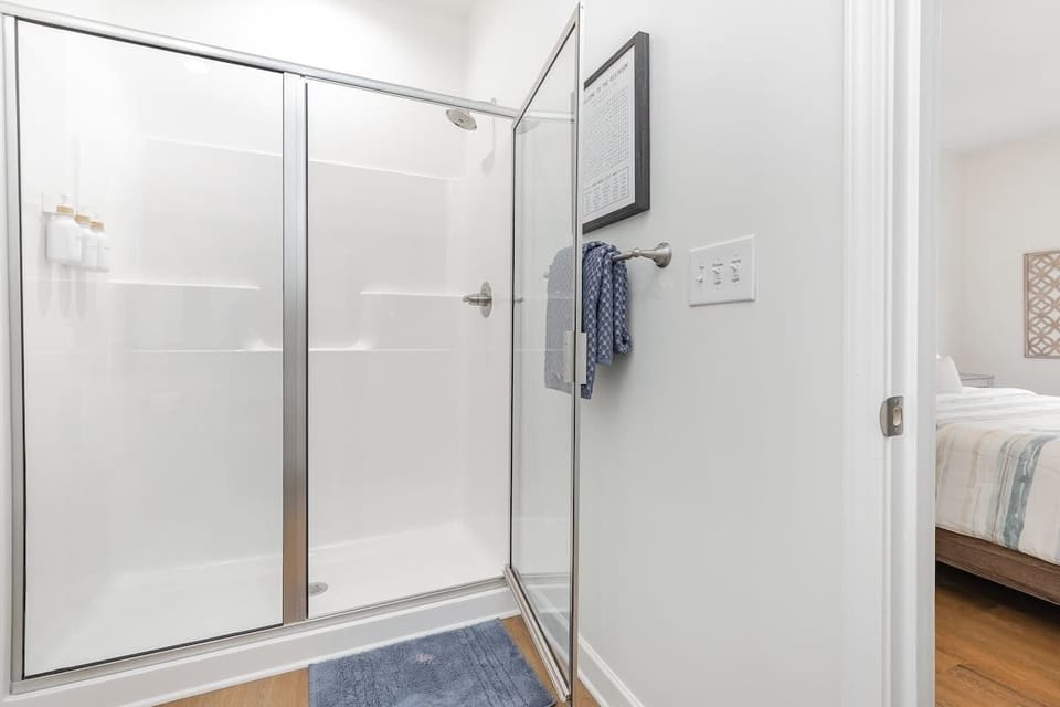 Bedroom 1 is our master bedroom and comes with an ensuite full bathroom with standup shower. All bath linens are provided as well as shampoo and conditioner and hair dryer.