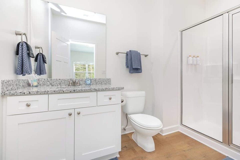 Both of the master bedrooms come with an ensuite full bathroom with standup shower. All bath linens are provided as well as shampoo and conditioner and hair dryer.